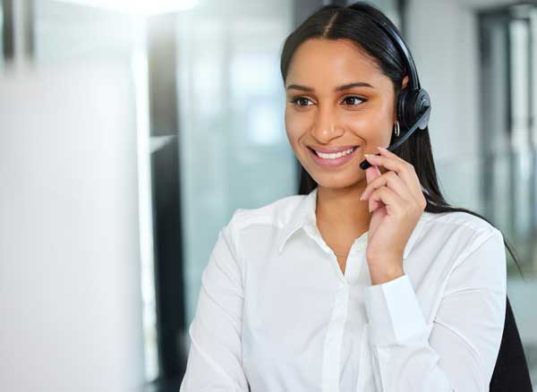 smiling-woman-working-as-a-customer-service-agent